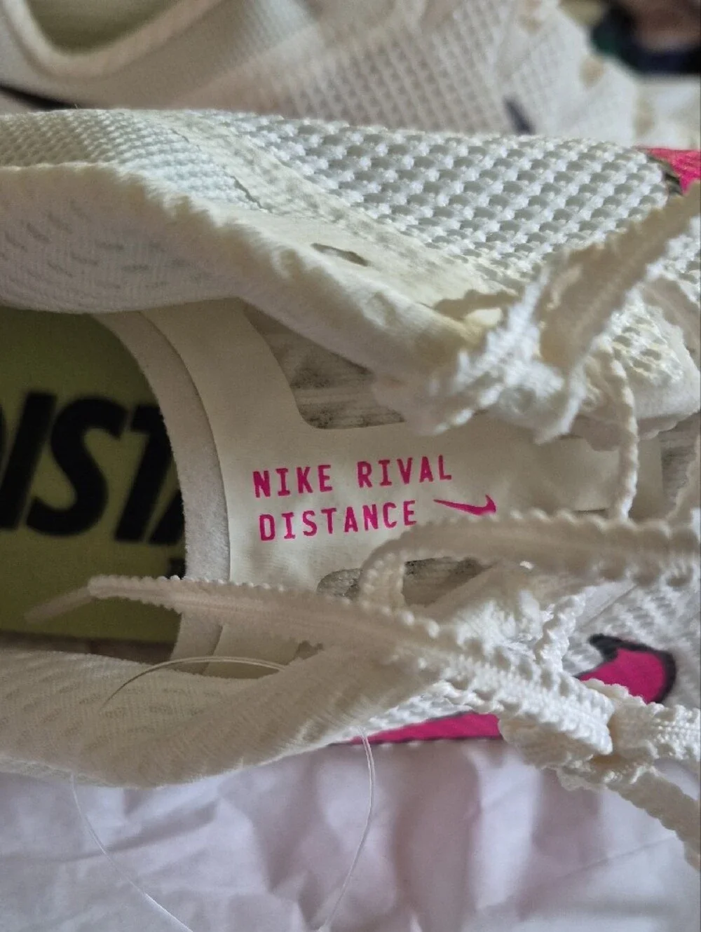 Nike White Athletic Shoes with Pink Swoosh